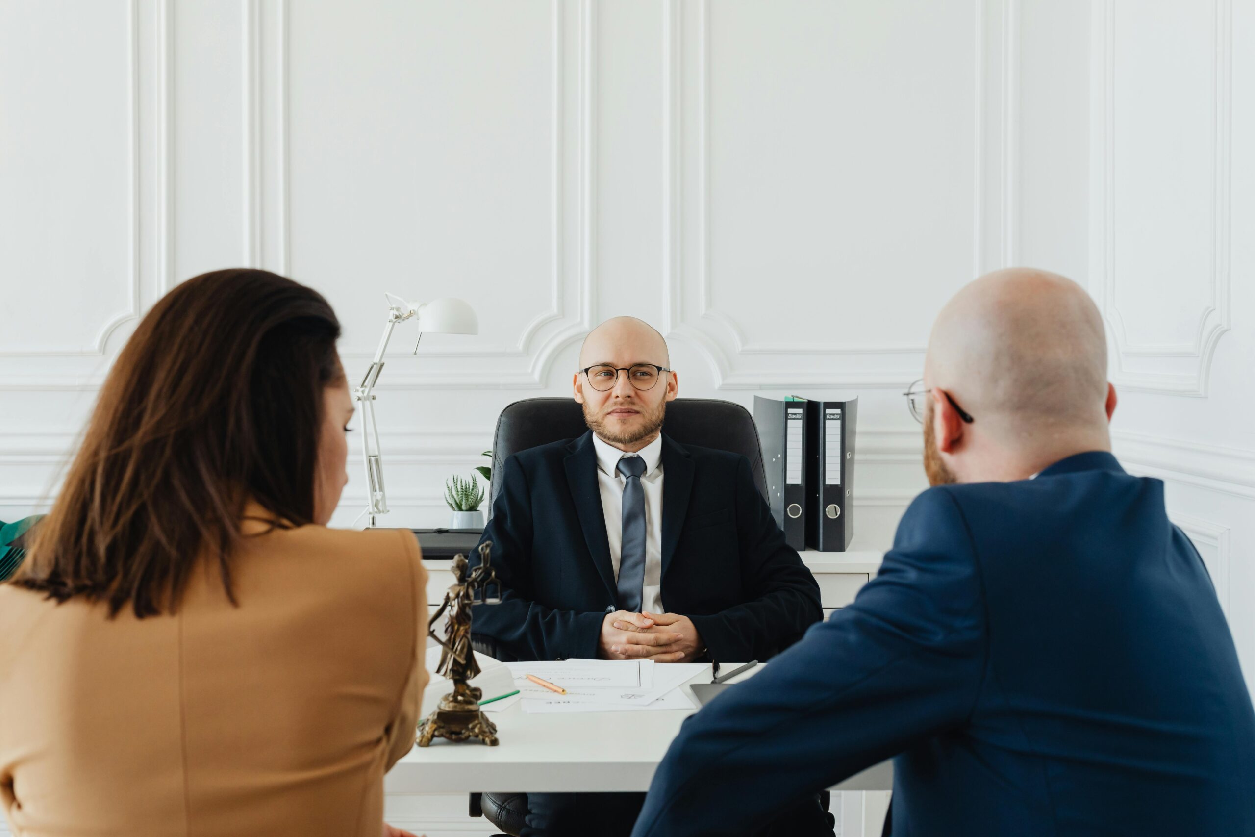 A Couple Consulting a Lawyer · Free Stock Photo